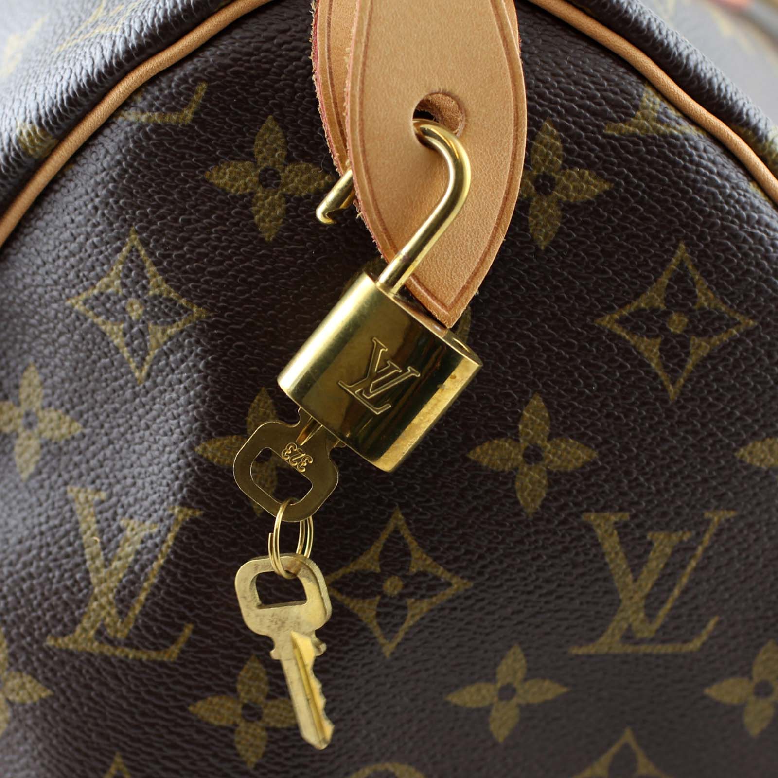 Louis Vuitton Monogram Speedy 35 Lock