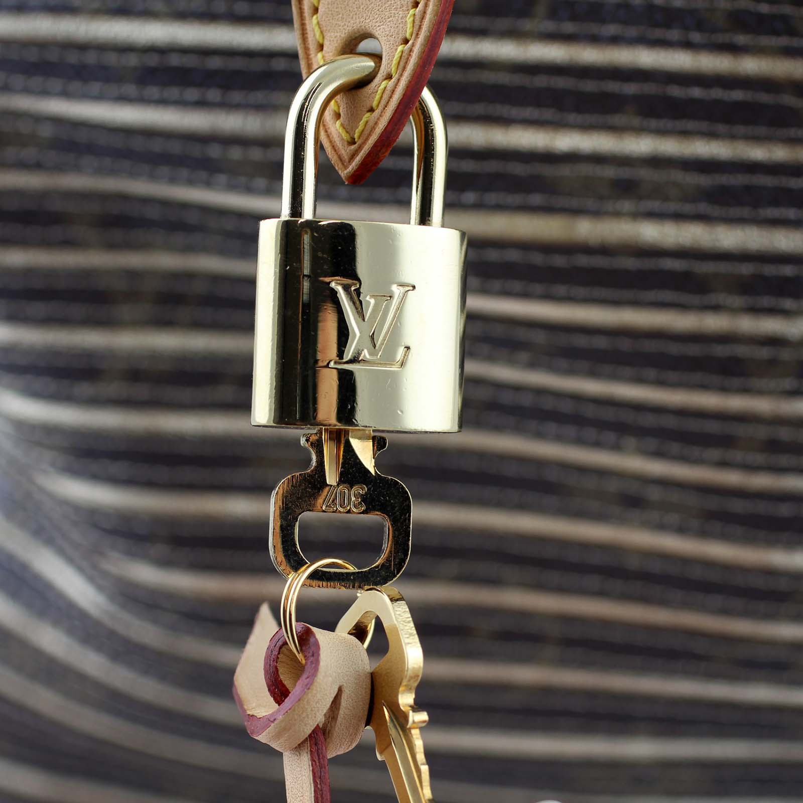 Louis Vuitton Monogram Eden Speedy Padlock