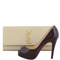 Saint Laurent Cassandre Clutch Scale