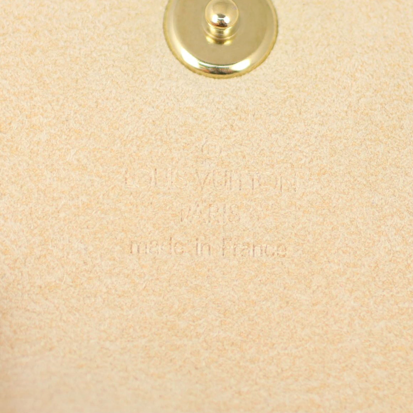 Louis Vuitton Pochette Cancun Monogram Stamp