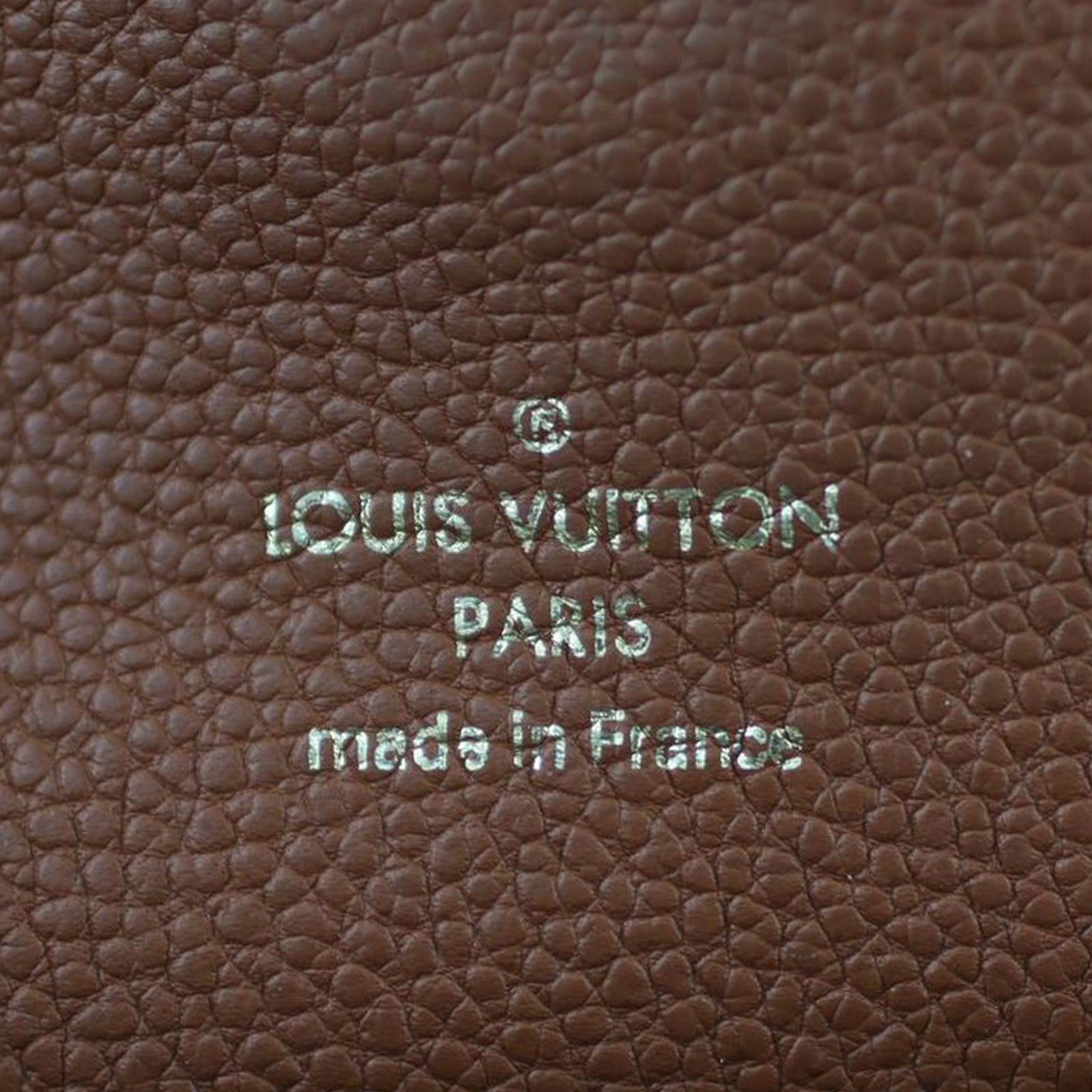 Louis Vuitton Manhattan NM Monogram Stamp
