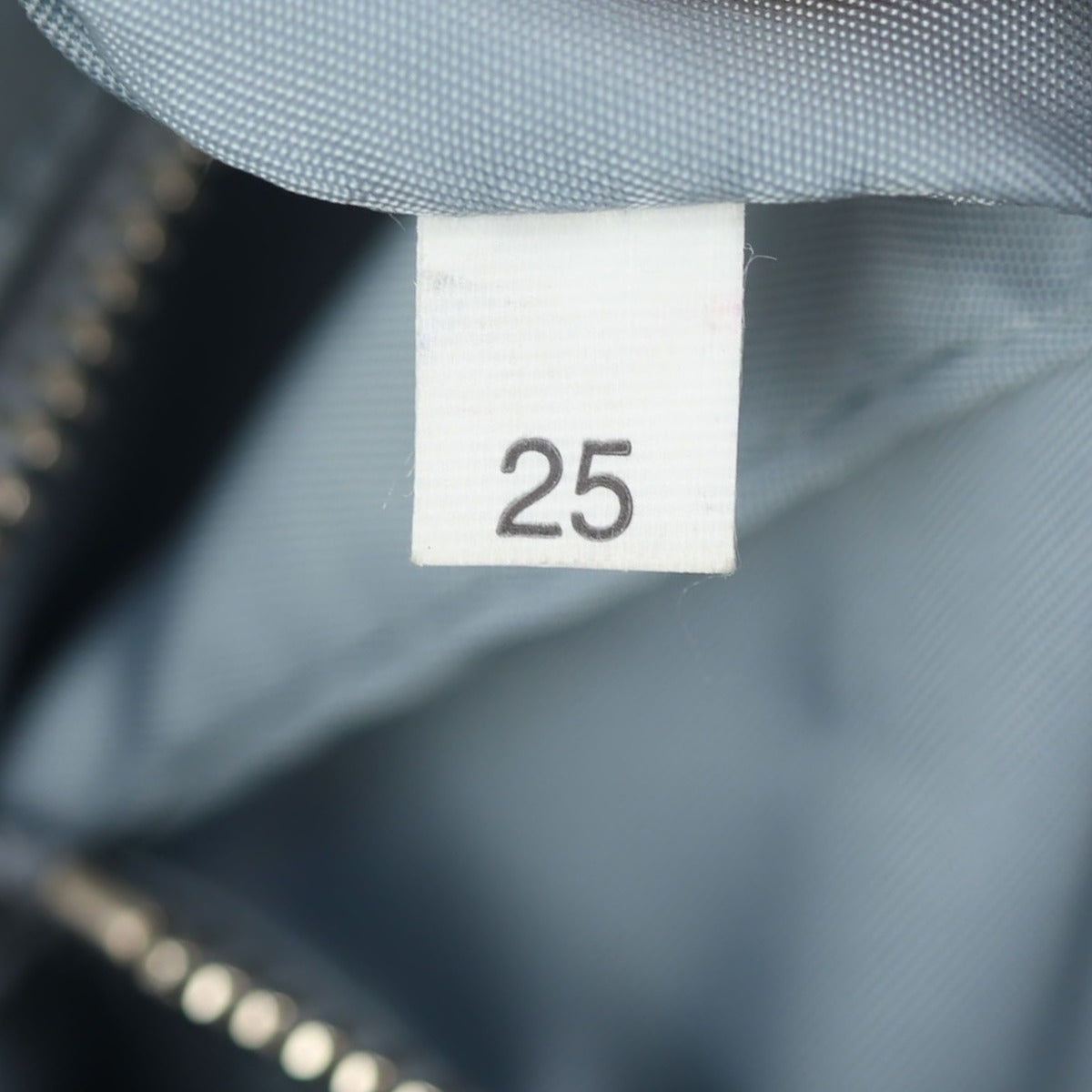 Prada Etiquette Studded Tessuto Messenger Bag Date code
