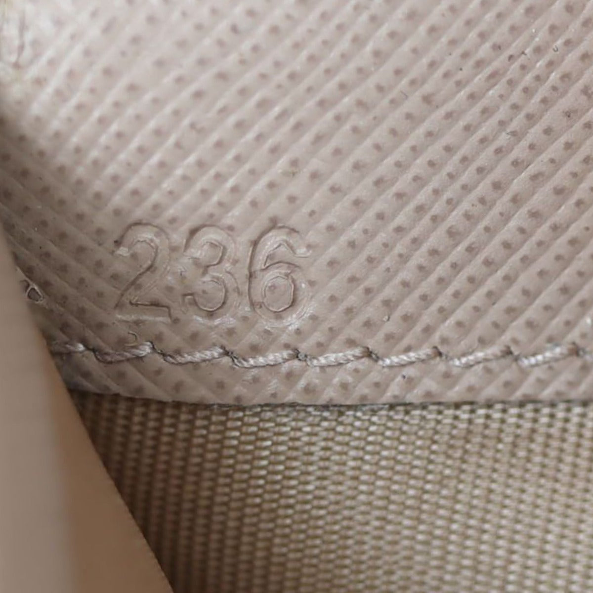 Prada Saffiano Metal Wallet on Chain Date code
